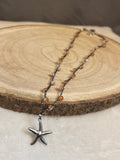 Collier argenté en crochet fait main avec perles et pendentif